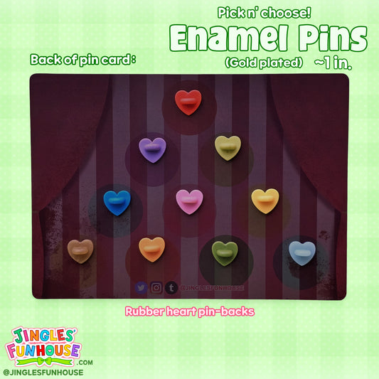 The back of the colorful backing card for the hard enamel pins of The Losers' Club, Pennywise, Bob Gray, and Georgie.
Each character has a different-colored, rubber heart-shaped pin-back; the back of the backing card showcases the pin-backs.
The colors for each character's pin-back are as follows: Bill (Purple), Mike (Yellow), Richie (Pink), Eddie (Dark Blue), Stan (Light Blue), Beverly (Dark Green), Ben (Orange), Georgie (Gold), Pennywise (Red), and Bob Gray (Light Green).
Made by Jingles' Funhouse.