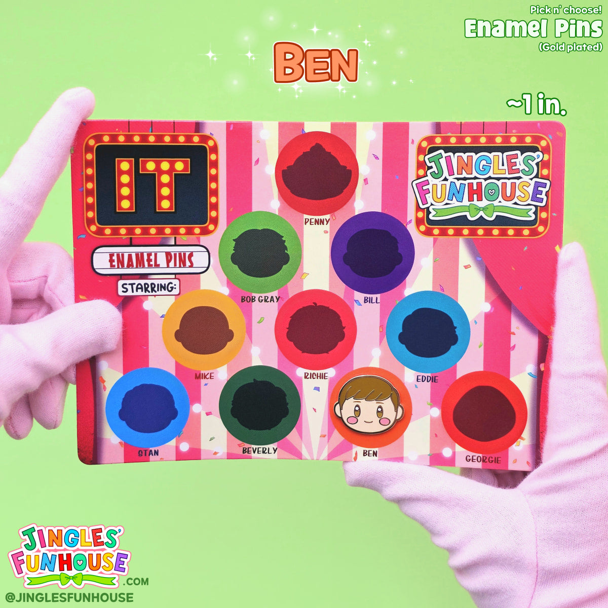 A hard enamel pin of Ben Hanscom (from the movie "IT") attached onto a colorful backing card.

The size of the pin is approximately 1 inch. 

Made by Jingles' Funhouse.